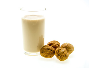 milk with walnut on a white background