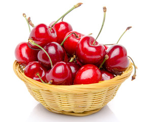 Fresh red cherries in a basket
