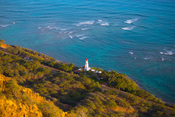 Red and White Lighthouse at the Sea