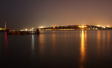 Fototapeta na wymiar Istanbul historical peninsula night view, the lights of the night reflect on the sea