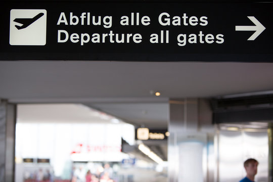 Airport white gates departure sign