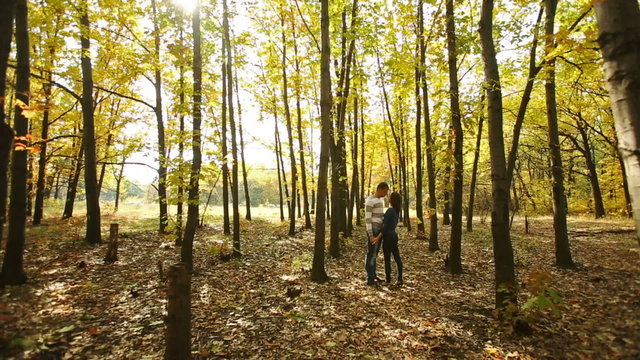 Couple in Autumn Forest