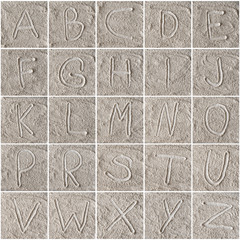 handwritten alphabet letters on flour