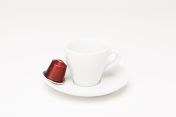 Coffee cup with capsule