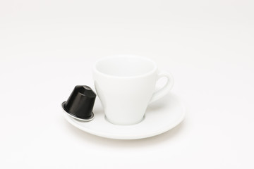 Coffee cup with capsule