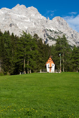 Small cute little church in the Dolomites