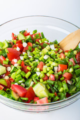 vegetable salad with fresh tomatoes cucumbers and green onions