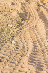 Wheel tracks on dirt