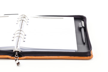 Brown leather cover of binder notebook.