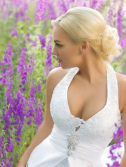 Beautiful bride with stylish make-up in white dress