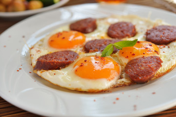 Fried eggs with sucuk