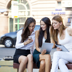 Business people sitting on a bench