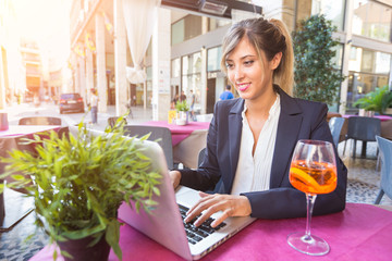 Young Businesswoman with Laptop during a Break