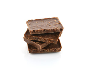 Closeup detail of chocolate parts on white background.