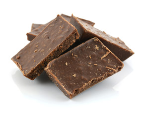 Closeup detail of chocolate parts on white background.