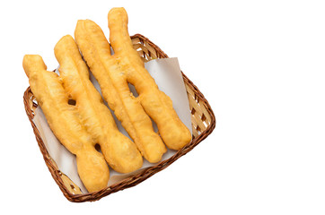 deep-fried dough stick in wooden basket