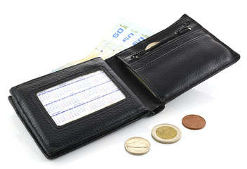 Leather wallet and banknotes on a white background.