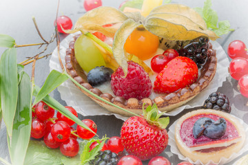 Composition With Fruit Tarts And Cupcakes