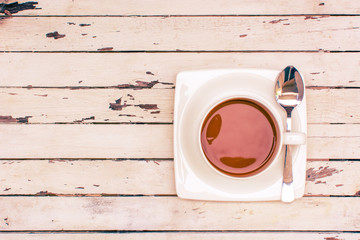 Cup of Coffee on Wooden Table