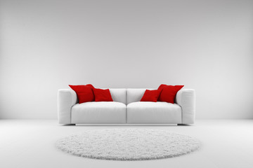 White couch with red pillows