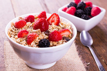 Muesli with blackberries, raspberries and strawberries