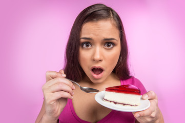 young woman hold delicious piece of cake.