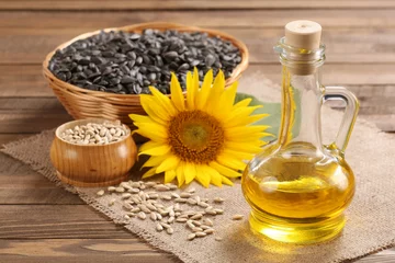 Fototapete Rund sunflower oil, seed and sunflower © syomao