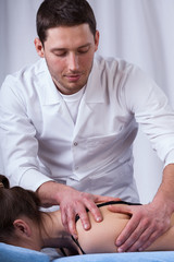 Fototapeta premium Palpation of the shoulder