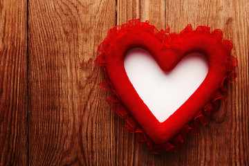 red heart on wood with copy space