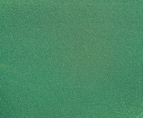 Texture of a green woven synthetic waterproof fabric