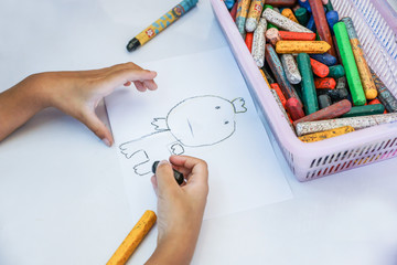 Boy drawing cartoon