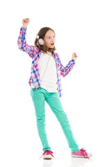 Dancing girl with headphones