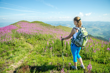 Young woman hiking in the mountains