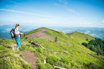 Young woman hiking in the mountains