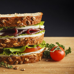 Sandwich on wood background