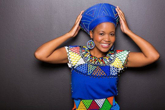 african model in traditional attire posing