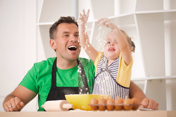 Father and daughter cooking