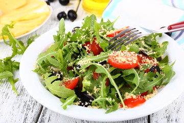 Fresh salad with arugula, close up