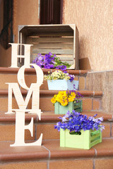 Stair steps decoration with wildflowers and decorative letters