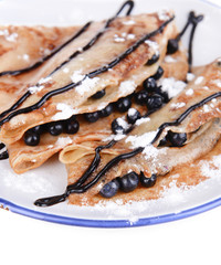 Delicious pancakes with blueberries close-up