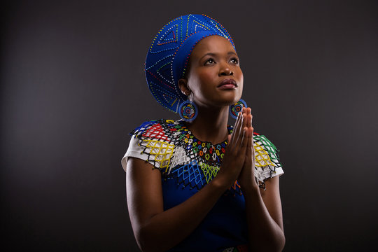 young african woman praying