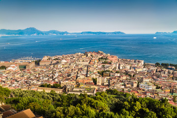 Fototapeta premium City of Napoli (Naples) with Gulf of Naples at sunset, Italy