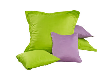 pile of green and violet pillows isolated on white background