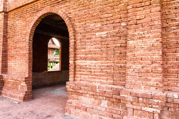 Entrance door and window openings of the old red brick wall