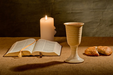 chalice of wine and bible