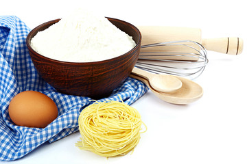 Supplies and ingredients for baking or making pasta.