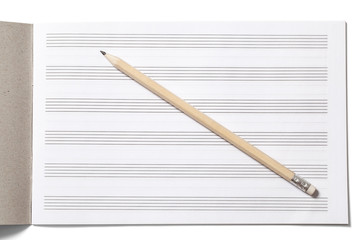 Notebook for Musical Notes and Pencil