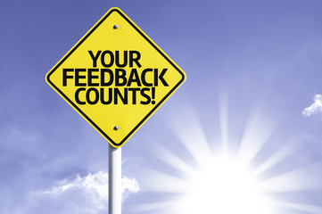 Your Feedback Counts road sign with sun background