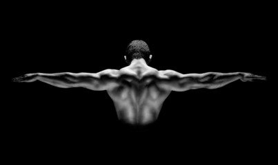 healthy muscular man with his arms stretched out isolated - obrazy, fototapety, plakaty