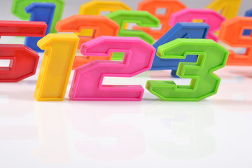 Fototapeta premium Colorful plastic numbers 123 on white